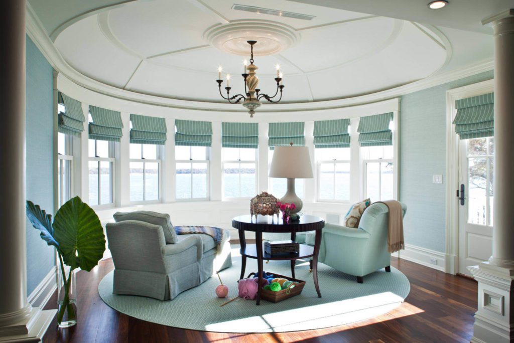 Round shaped room with cyan furniture