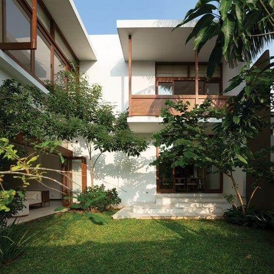 Balcony space with garden view in a farmhouse