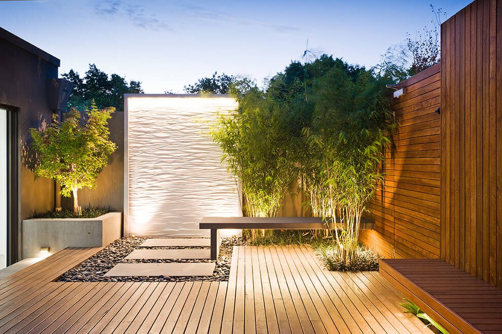 Wooden panels as a hardscaping material in the backyard