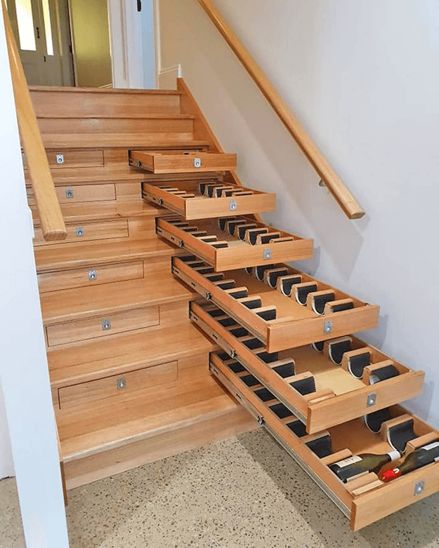 Storage drawers underneath the stairs