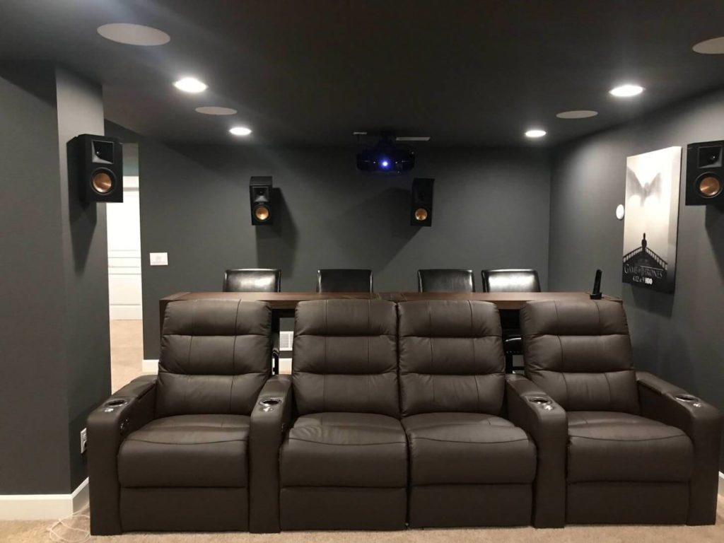 An entertainment den home theatre created in basement of a house