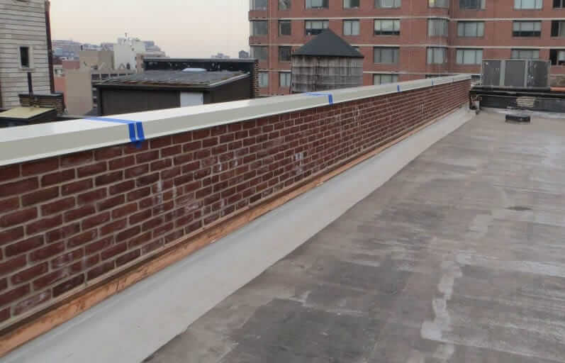 Flat parapet wall on the top of a flat roof