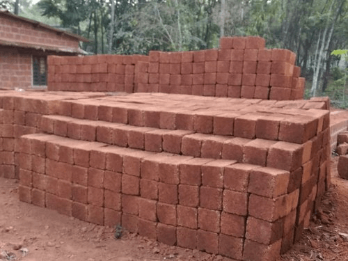 Laterite bricks stacked for house construction