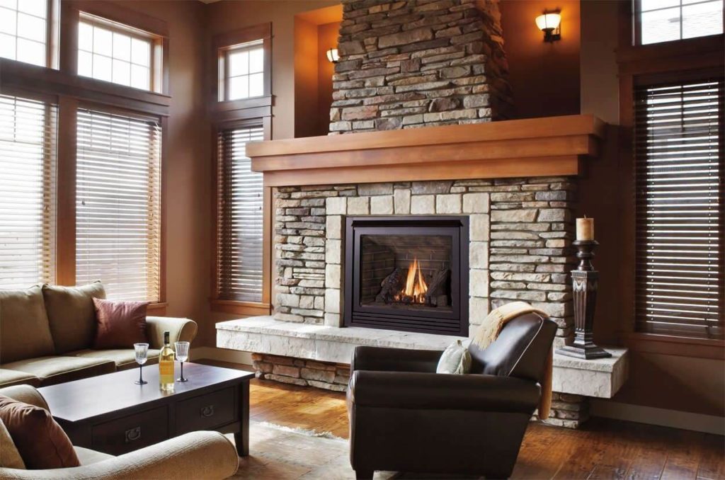 picture of a ventless fireplace with brown wooden work .