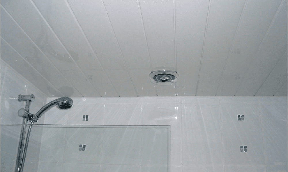 Tile ceiling in bathroom in white color